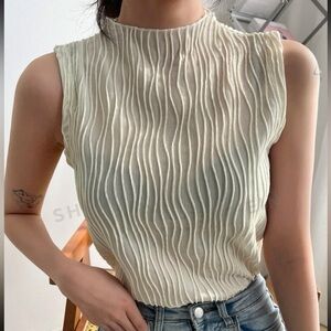 White high-neck ribbed top